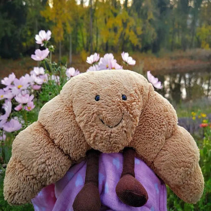 SnuggleCrumb™ – Smiling Croissant Plush Toy – Soft Cuddly Pillow
