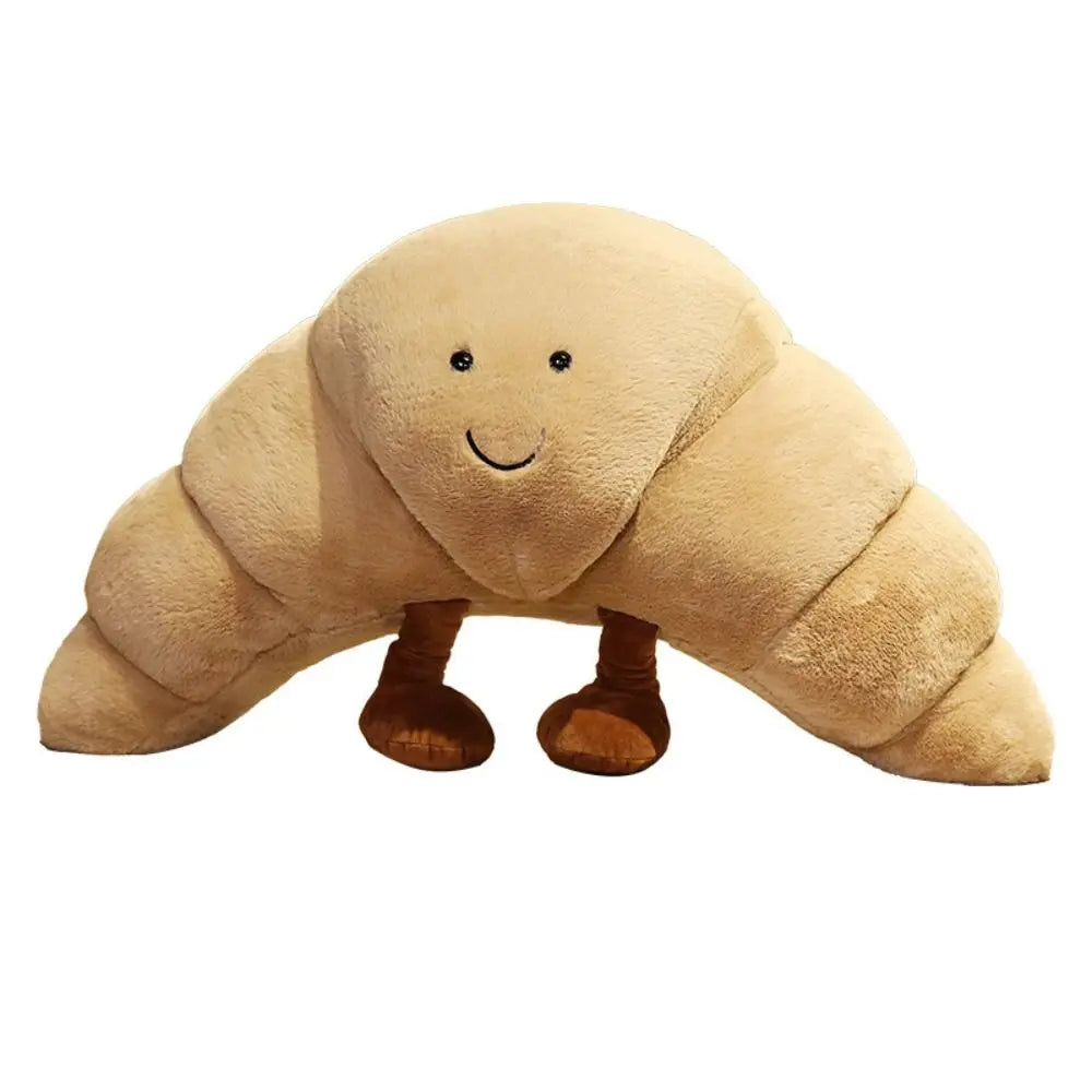 SnuggleCrumb™ – Smiling Croissant Plush Toy – Soft Cuddly Pillow