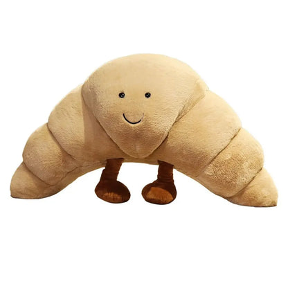 SnuggleCrumb™ – Smiling Croissant Plush Toy – Soft Cuddly Pillow